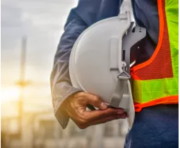 engineer-holding-hard-hat-construction